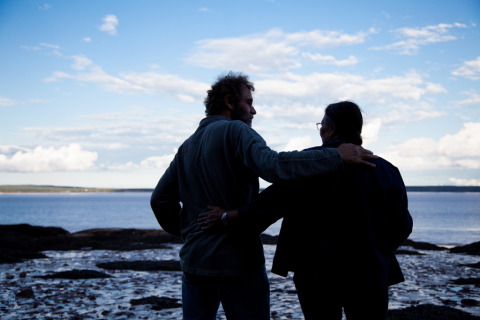 Two people standing arm in arm - Claudine Chaussé on Lightstock - Used by Permission